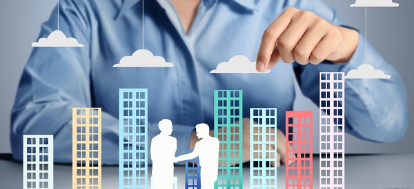 Building in hand businessmen